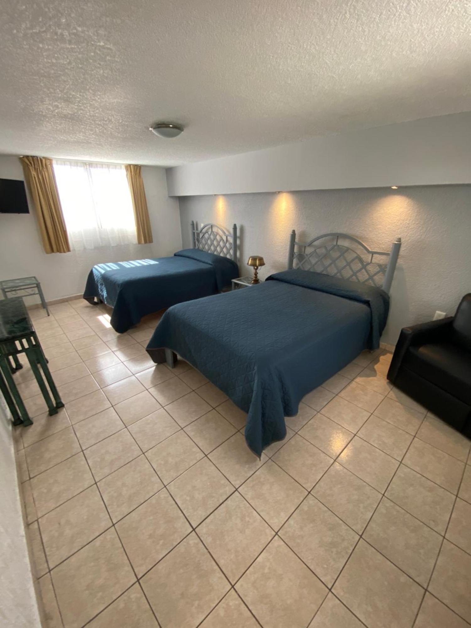 Hotel Qualitel Plus Морелия Экстерьер фото